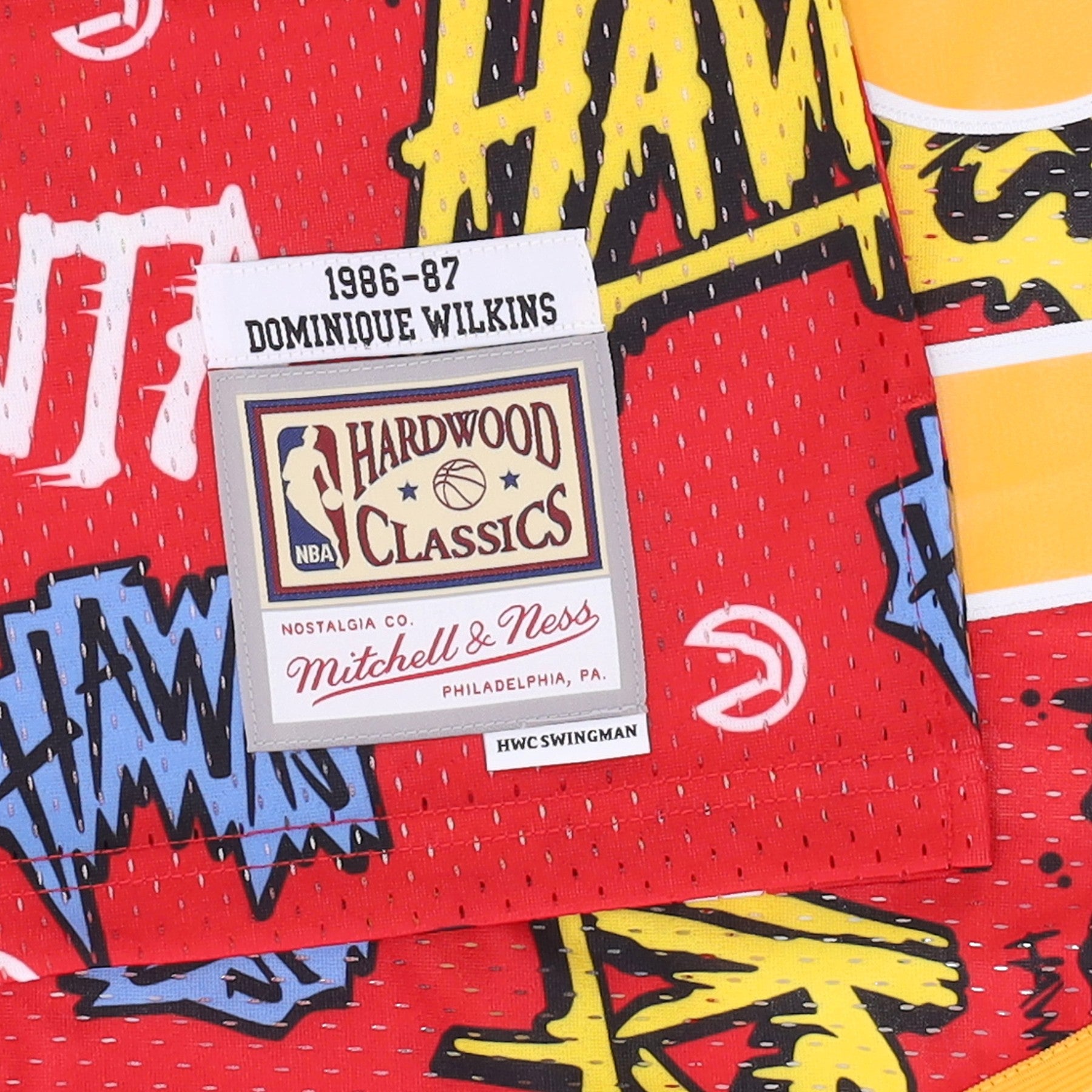 Mitchell & Ness, Canotta Basket Uomo Nba Slap Sticker Swingman Jersey Hardwood Classics No 21 Dominique Wilkins 1986-87 Atlhaw, 