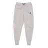 Nike, Pantalone Tuta Felpato Uomo Sportswear Tech Fleece Winter Jogger, Cobblestone/black